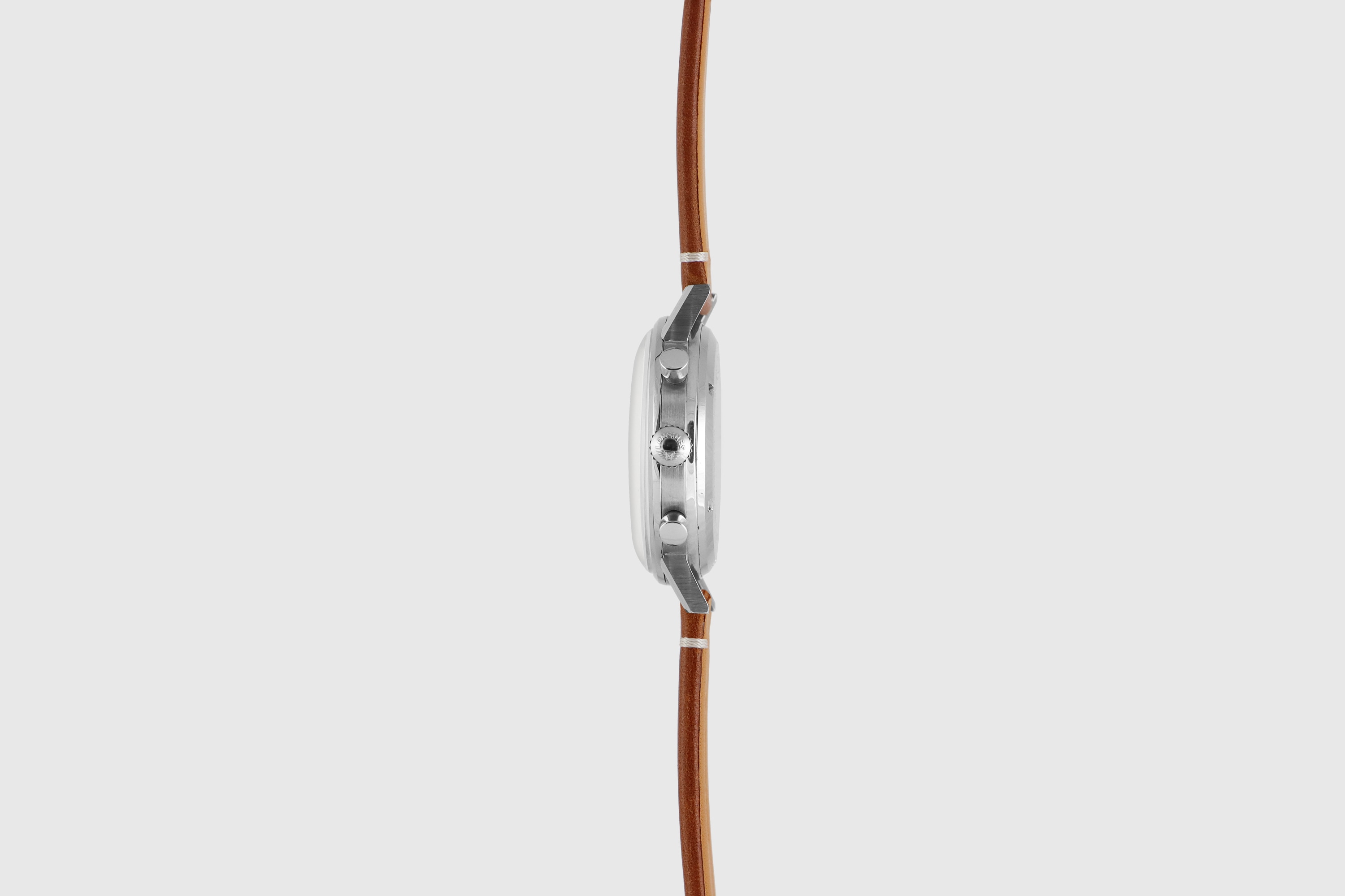 Longines 7413. Opposite case profile. · Photo: Longines · © Longines; permission not recorded · Source: https://www.longines.com/en-my/p/watch-longines-flyback-chronograph-30ch-1965-7413-13333446