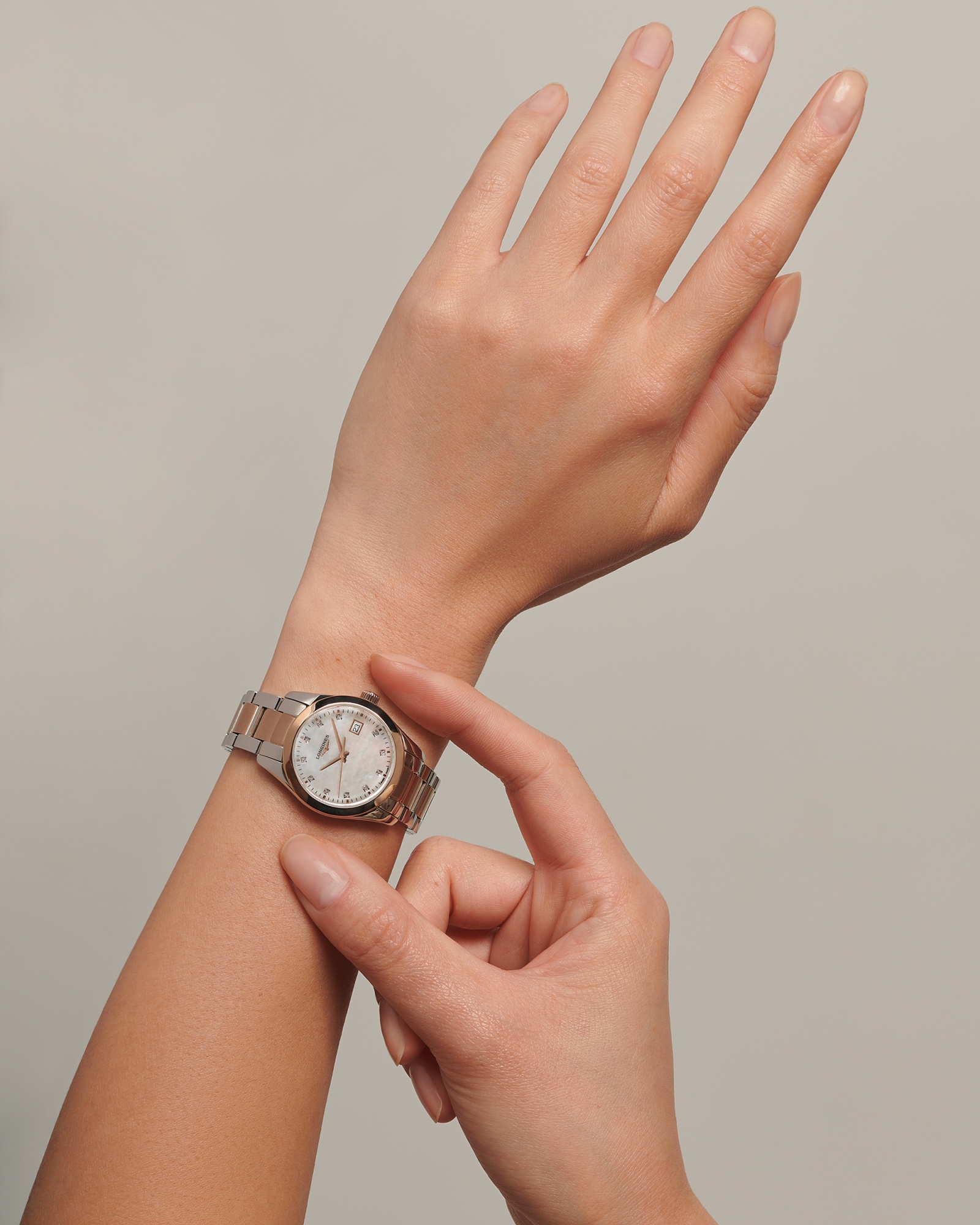 コンクエスト クラシック クォーツ、ステンレススティール＆レッド Pvd