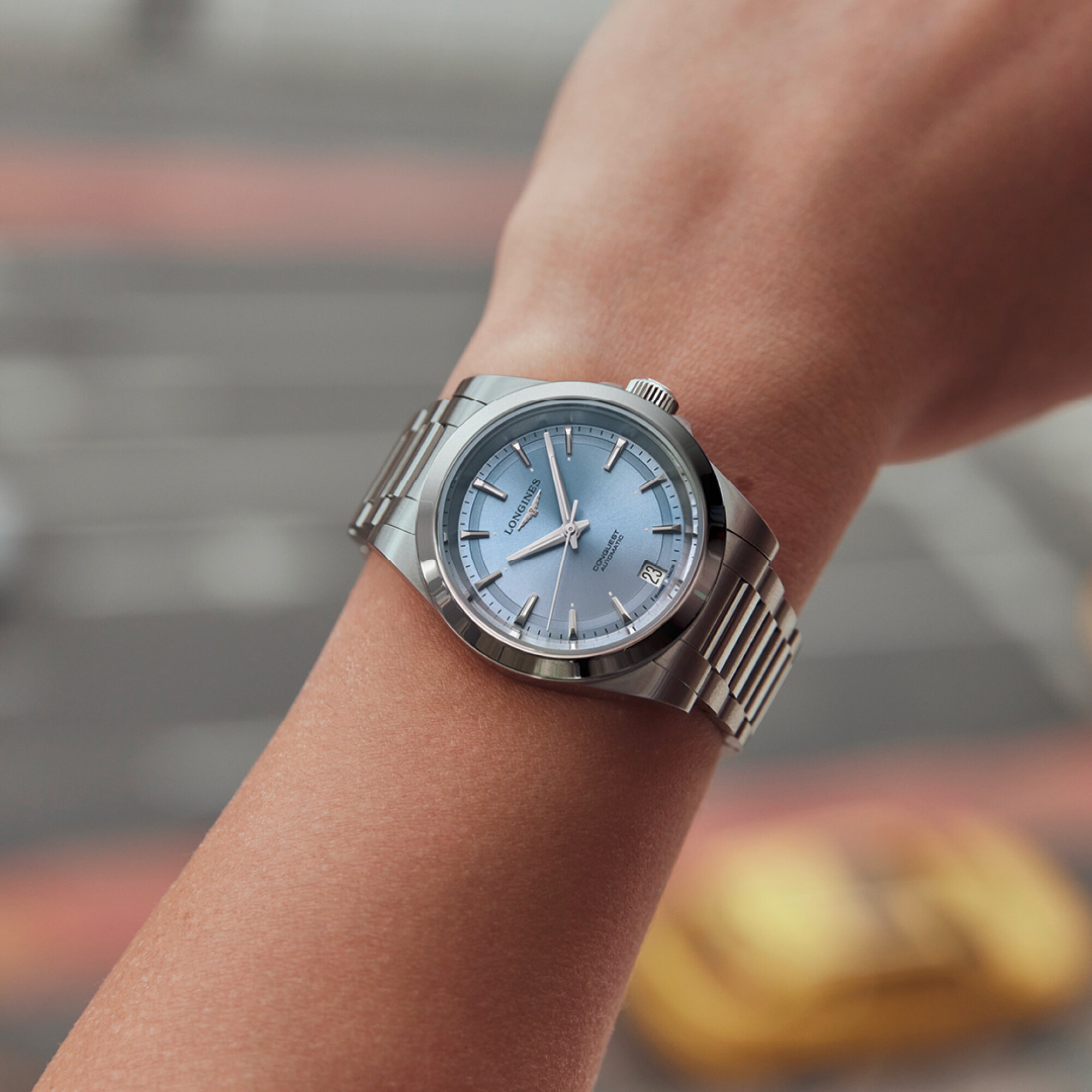 コンクエスト 自動巻、ステンレススティール、ブルー「サンレイ