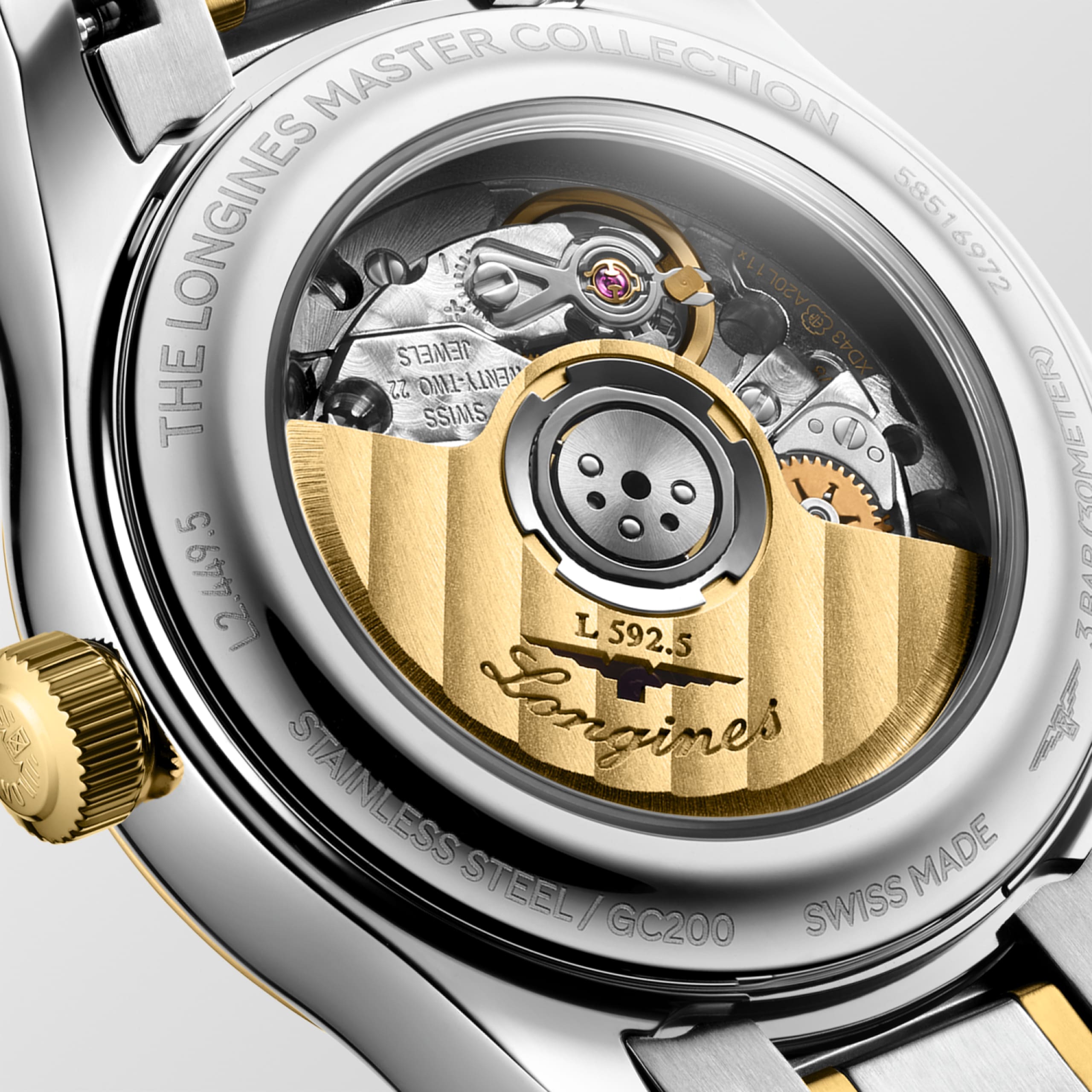 THE LONGINES MASTER COLLECTION L2.449.5.87.7 Automatik, Edelstahl mit 18 Karat Gelbgold Cap 200, Weißes Perlmutt, Armband Watch - Nahaufnahme Rückseite