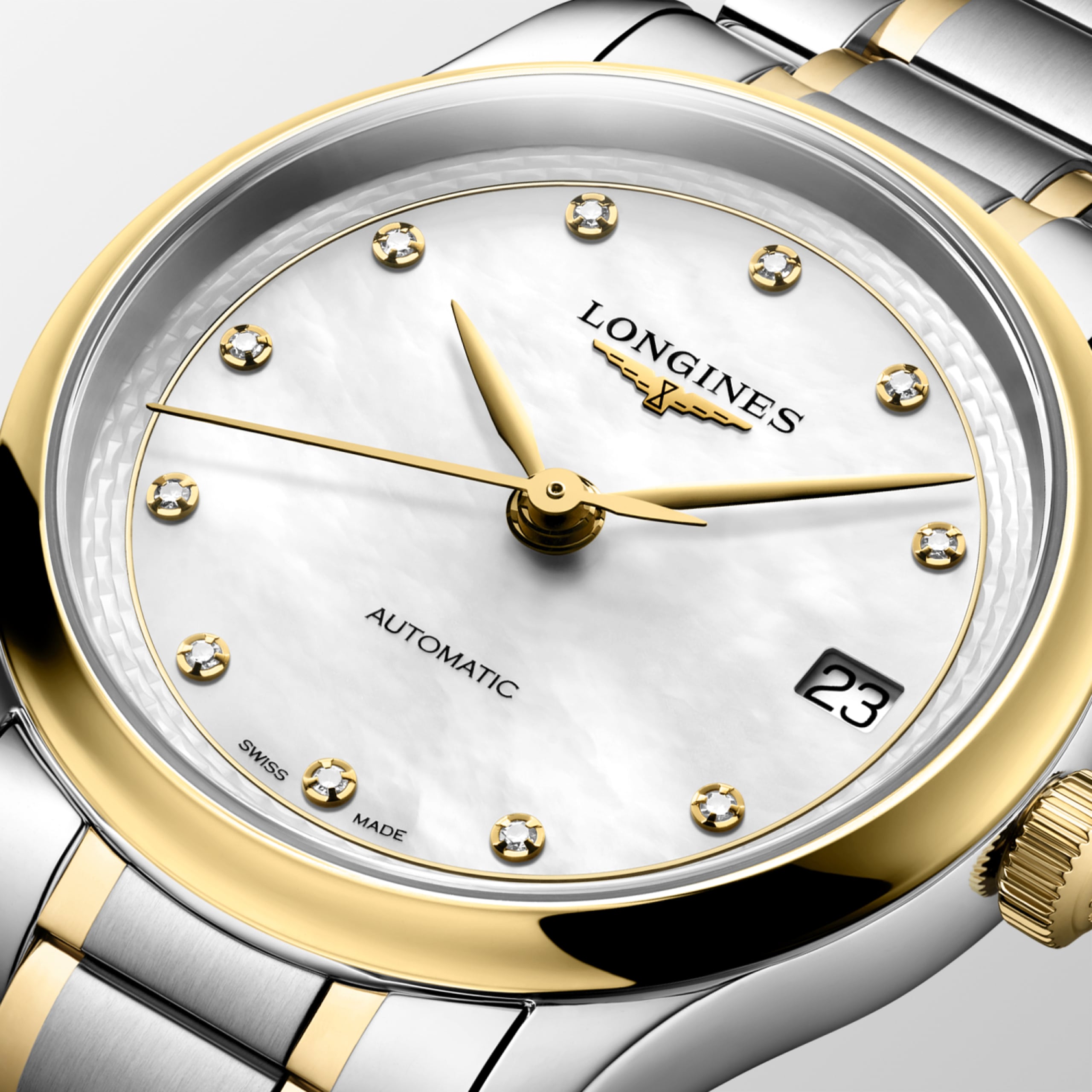 THE LONGINES MASTER COLLECTION L2.450.5.87.7 Automatic, Stainless steel and 18 karat yellow gold cap 200, White mother-of-pearl, Bracelet Watch - Face close up