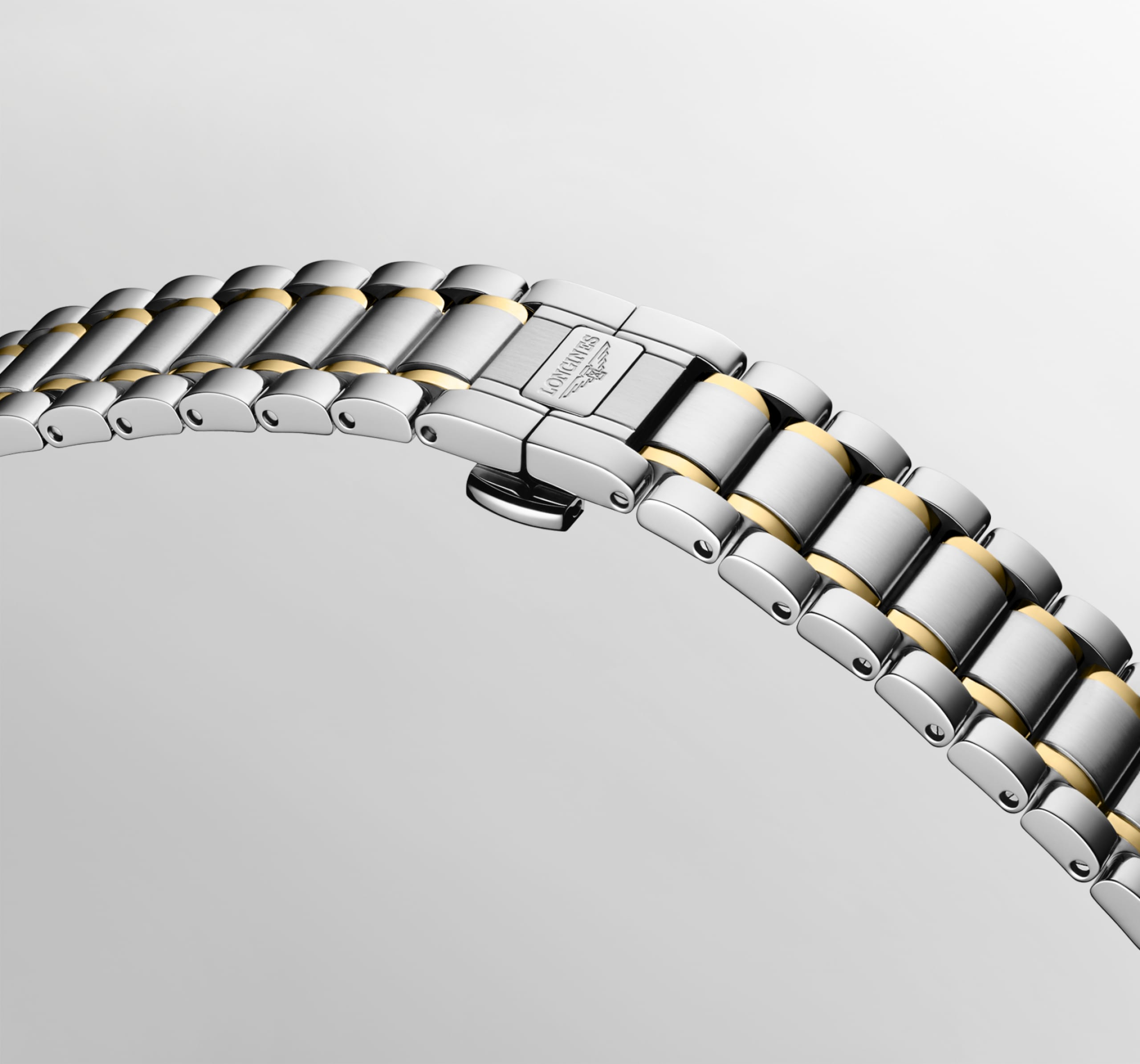 THE LONGINES MASTER COLLECTION L2.450.5.87.7 Automatic, Stainless steel and 18 karat yellow gold cap 200, White mother-of-pearl, Bracelet Watch - Buckle